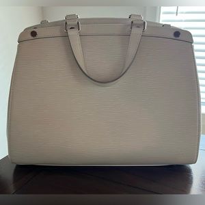 Cream colored LV Bag